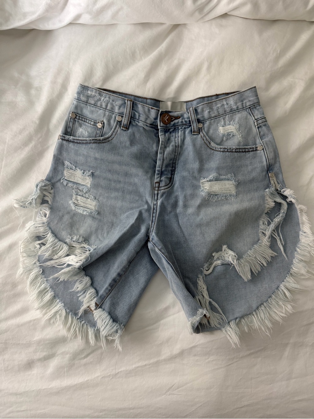 ONETEASPOON Frankies Light Blue Distressed Denim Shorts